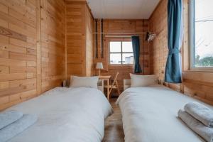 Llit o llits en una habitació de c-flat
