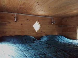 Postel nebo postele na pokoji v ubytování Refugio El Hualo y La Huala del Achibueno