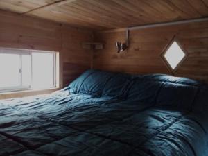 Postel nebo postele na pokoji v ubytování Refugio El Hualo y La Huala del Achibueno