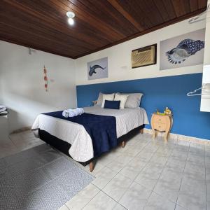 Postel nebo postele na pokoji v ubytování POUSO DE ICARO - POUSADA NO CENTRO de PARATY