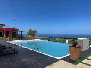 Bazén v ubytování Blissdesiac Ocho Rios Villa nebo v jeho okolí