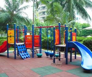 a playground with a slide in a park at Costa Mahkota Sea view 1-Bedroom Retreat in Melaka