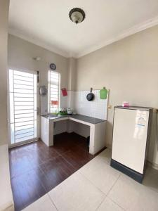 Kitchen o kitchenette sa Combretrata