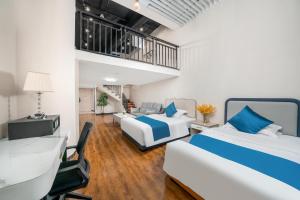 Guangzhou Youke Serviced Apartment1min to Line5 Taojin STN-Free shuttle bus during the Canton Fair客房内的一张或多张床位