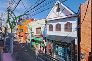 a building on the side of a city street at V Close to Kyodo sta 12 min to Shinjuku in Tokyo