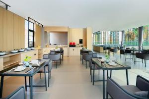 Posezení v ubytování 龚禧里初见版纳店