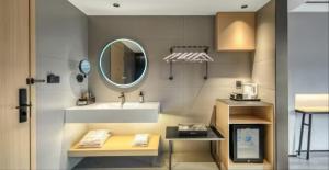 Fotografie z fotogalerie ubytování 龚禧里初见版纳店 v Jinghongu + 25 fotografií