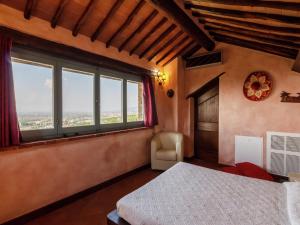 Posteľ alebo postele v izbe v ubytovaní Villa in Cortona with Private Pool