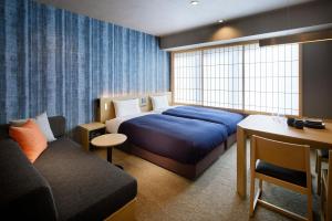 Posezení v ubytování Minn Karasuma Gojo Kyoto Station North