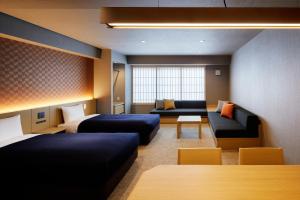 Posezení v ubytování Minn Karasuma Gojo Kyoto Station North