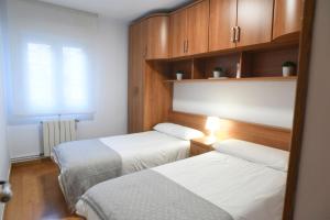 Postel nebo postele na pokoji v ubytování Encanto Puertochico - Céntrico y con Netflix gratis