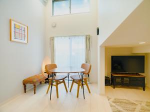 Posezení v ubytování YOUR ROOM 熊本駅 little