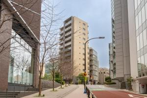 a city street with tall buildings and a street light at Akasaka Residence in Tokyo