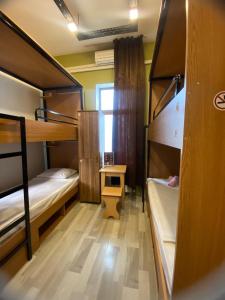 Postel nebo postele na pokoji v ubytování Central Hostel