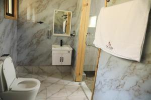 Vannituba majutusasutuses The Giraffe Cottages