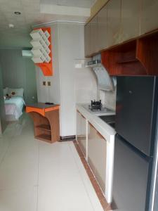 Kuchyň nebo kuchyňský kout v ubytování Baoly Clark Residences + 2 fotografie