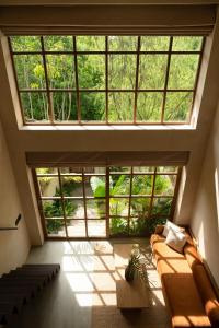 Χώρος καθιστικού στο Calista Studios TIGA Quiet 1 BR home in peaceful jungle 10 mins away from the buzz of Uluwatu