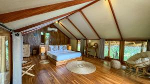 Postel nebo postele na pokoji v ubytování Glamping Wilpattu by Thamaravila