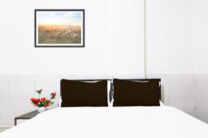 Super Hotel O Fazalpur客房内的一张或多张床位