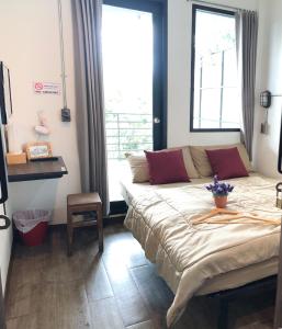 Feel Good Hostel bk客房内的一张或多张床位