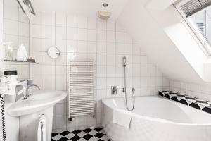 Vannituba majutusasutuses Tailormade Hotel KRONE Sarnen
