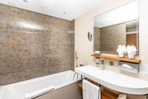 Vannituba majutusasutuses Tailormade Hotel KRONE Sarnen