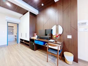 TV a/nebo společenská místnost v ubytování Champa Resort & Spa