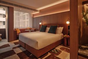 Postel nebo postele na pokoji v ubytování The EVE Hotel Sydney + 17 fotografií
