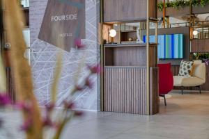 Posezení v ubytování FourSide Hotel Ringsheim, Trademark Collection by Wyndham