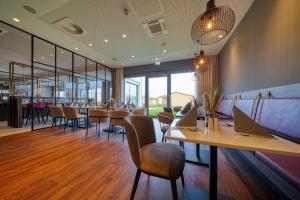 Restaurace v ubytování FourSide Hotel Ringsheim, Trademark Collection by Wyndham