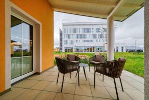 Posezení v ubytování FourSide Hotel Ringsheim, Trademark Collection by Wyndham