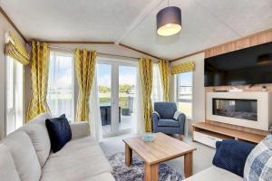 Posezení v ubytování Lodge No 55 - Stewart's Resort Cameron