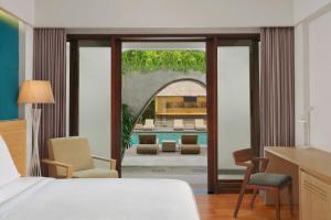 Postel nebo postele na pokoji v ubytování Element Bali Ubud
