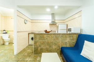 Kuchyň nebo kuchyňský kout v ubytování Apartamentos Casamonteymar + 35 fotografií