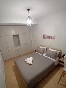 A bed or beds in a room at Marianna's room
