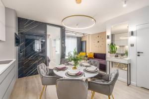 Część wypoczynkowa w obiekcie Apartamenty Fenomen - Premium Porto Nadmorskie Tarasy w Kołobrzegu