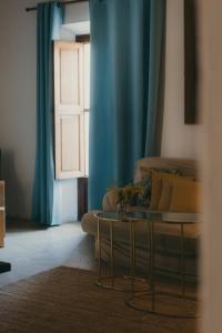 a living room with a couch and a table at Casa Mona, Turismo de Interior in Llubí +128 photos