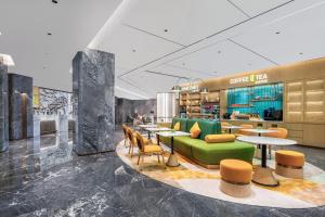 Area soggiorno di Home2 Suite by Hilton Foshan Lishui
