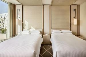 Ένα ή περισσότερα κρεβάτια σε δωμάτιο στο Rabat Marriott Hotel