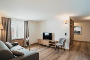 TV a/nebo společenská místnost v ubytování Hotel Brocco & Posta + 37 fotografií