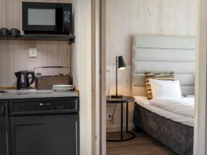 Postel nebo postele na pokoji v ubytování Ice Hotel