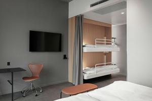 Rúm í herbergi á Four Points Flex by Sheraton Horsens