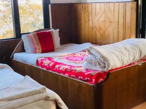 Voodi või voodid majutusasutuse Hotel Elephant toas