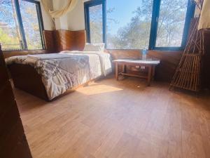 Voodi või voodid majutusasutuse Hotel Elephant toas