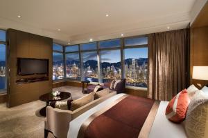 A bed or beds in a room at The Ritz-Carlton, Hong Kong