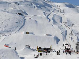 a group of people skiing down a snow covered mountain at Pré-vernay 7pers in Saint-Jean-dʼArves