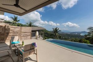 a villa with a swimming pool with a view at 2br boutique style villa Lipe in Bang Rak Beach