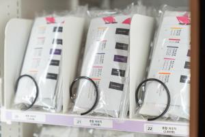 a pair of glasses sitting on a shelf at Cheonan H-Avenue Cheonan Buldang in Cheonan +180 photos