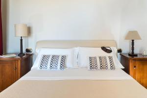 Postel nebo postele na pokoji v ubytování Villa Cielo