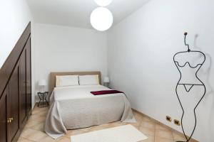 Postel nebo postele na pokoji v ubytování Villa Cielo